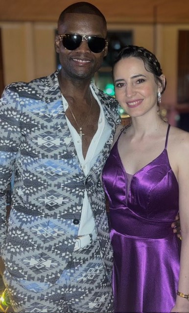 A couple dressed up at an evening event